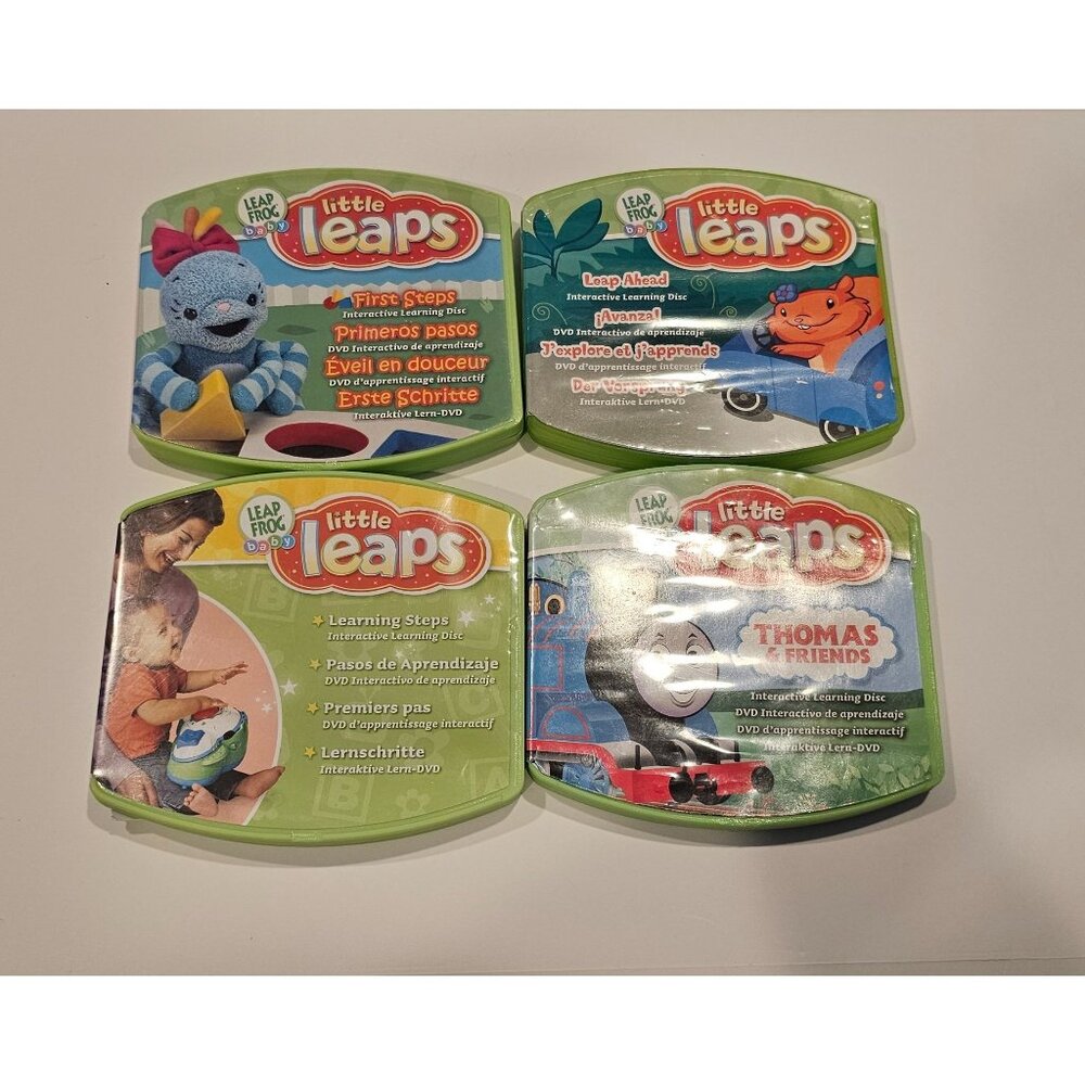 Lot of 4 LeapFrog Little Leaps Interactive Learning‎ DVDs